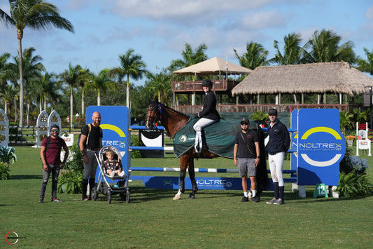 Rising showjumper Taylor Blackman competing in a showjumping event